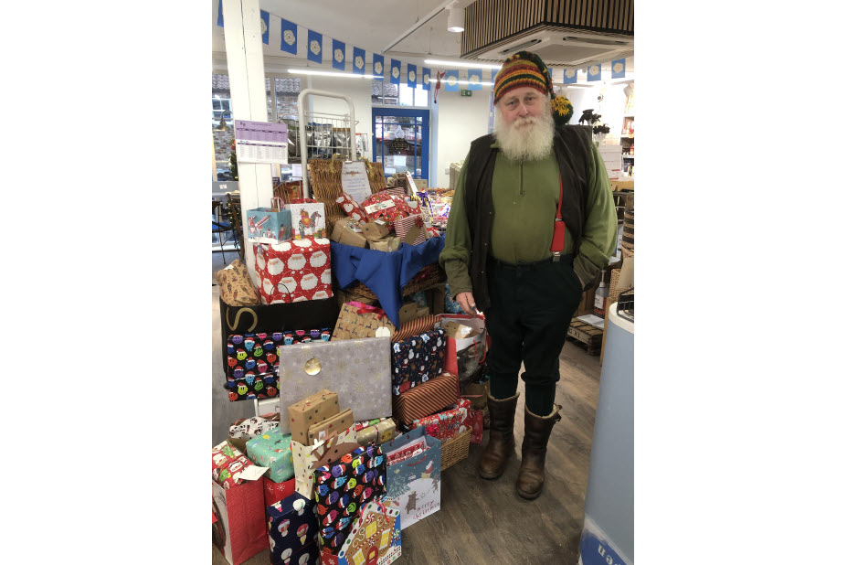 C;;r Arnold Warnaken dressed as Santa